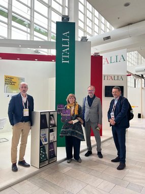 Beta nit people in the front of ICE booth at LB2022