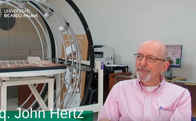Arch. John Hertz in front of Orchard Heliodon during an interview